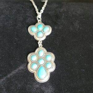Elegant Silver and Turquoise Pendant Necklace